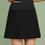 Polina – Juodas taškuotas mini sijonas su kontrastiniu liemeniu